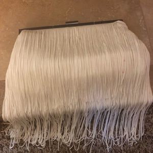 New York and company fringe clutch